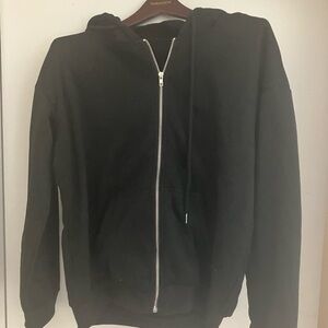 Men’s or ladies zip up sweatshirt.  Light material for spring.  Size S.  NWOT